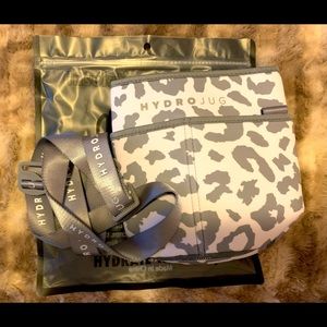 Hydrojug white leopard print canvas sleeve with holding strap.